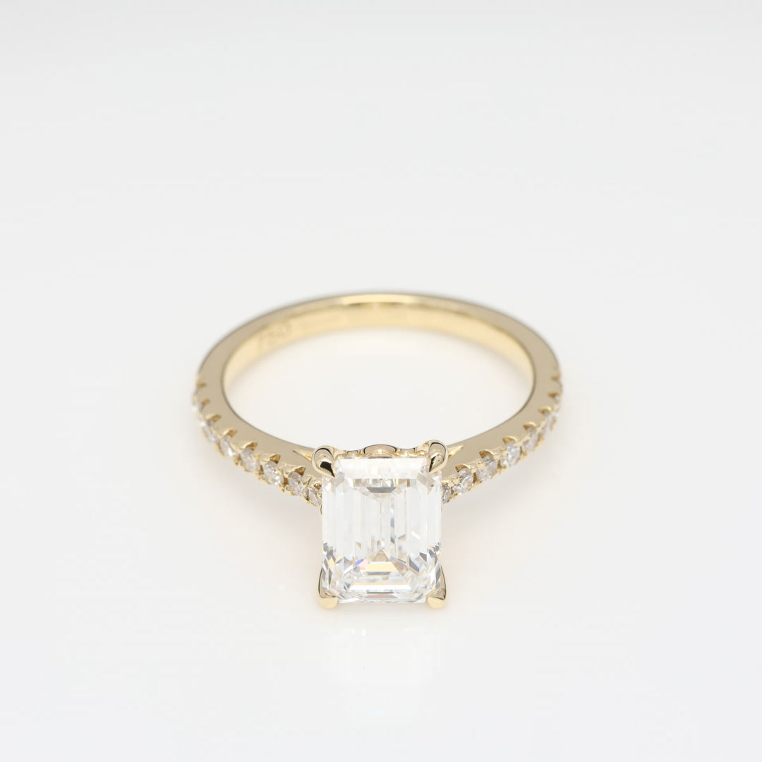 Precious 2 Carat Emerald-Cut Engagement Ring with Side Stones in 18K Yellow Gold