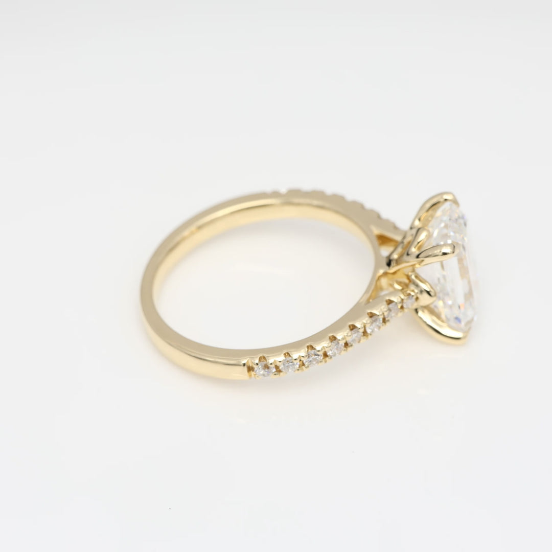 Precious 2 Carat Emerald-Cut Engagement Ring with Side Stones in 18K Yellow Gold
