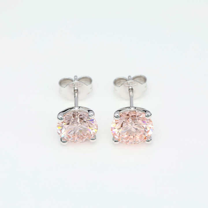 Customizable 4-Prong Round Brilliant Diamond Earrings – White or Fancy Color (Pink, Blue, Green)