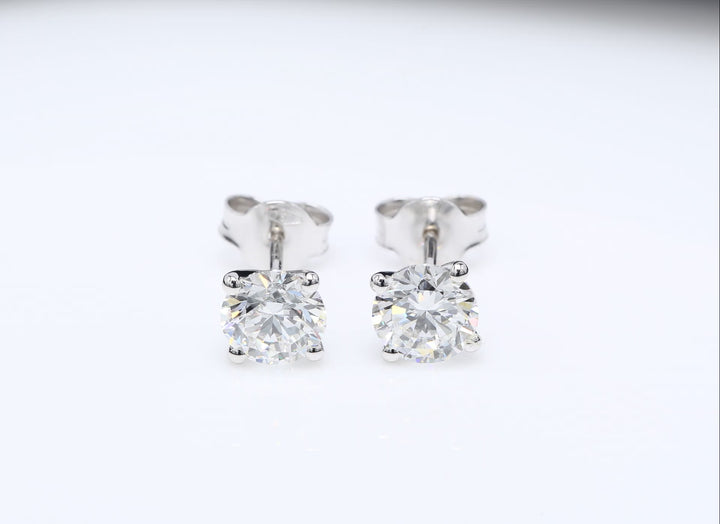 Customizable 4-Prong Round Brilliant Diamond Earrings – White or Fancy Color (Pink, Blue, Green)